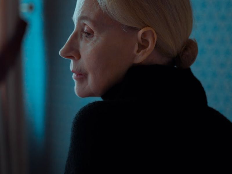 Person moving gracefully in a spacious, calm room.